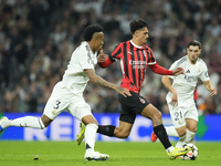 Tijjani Reijnders central midfield of AC Milan and Netherlands and Eder Militao centre-back of Real Madrid and Brazil compete for the ball d...