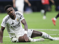 Vinicius Jr of Real Madrid reacts to a missed opportunity during the UEFA Champions League 2024/25 match between Real Madrid and AC Milan at...