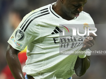 Vinicius Junior left winger of Real Madrid and Brazil celebrates after scoring his sides first goal during the UEFA Champions League 2024/25...