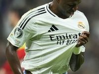 Vinicius Junior left winger of Real Madrid and Brazil celebrates after scoring his sides first goal during the UEFA Champions League 2024/25...