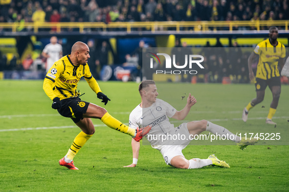 Donyell Malen of Borussia Dortmund scores his team's first goal during the UEFA Champions League 2024/25 League Phase MD4 soccer match betwe...