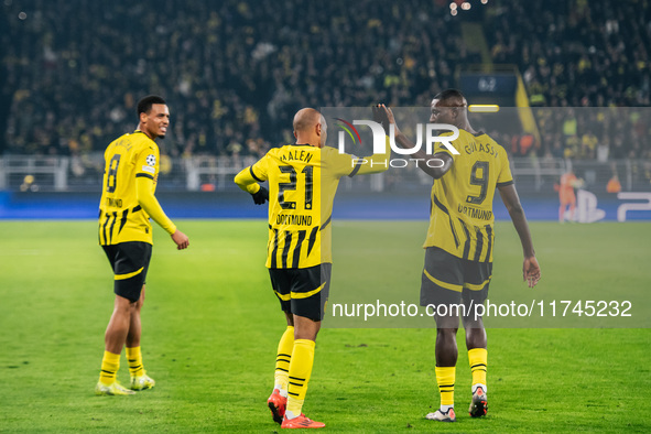 Donyell Malen of Borussia Dortmund celebrates his goal with Serhou Guirassy and Felix Nmecha during the UEFA Champions League 2024/25 League...