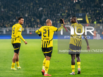 Donyell Malen of Borussia Dortmund celebrates his goal with Serhou Guirassy and Felix Nmecha during the UEFA Champions League 2024/25 League...