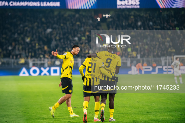 Donyell Malen of Borussia Dortmund celebrates his goal with Serhou Guirassy and Felix Nmecha during the UEFA Champions League 2024/25 League...