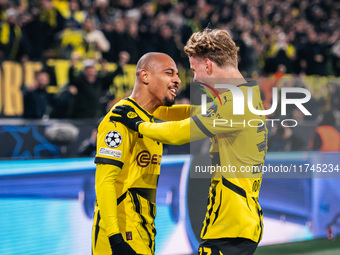 Donyell Malen of Borussia Dortmund celebrates his goal with Cole Campbell during the UEFA Champions League 2024/25 League Phase MD4 soccer m...