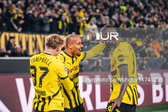 Donyell Malen of Borussia Dortmund celebrates his goal with Cole Campbell and Serhou Guirassy during the UEFA Champions League 2024/25 Leagu...