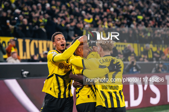 Donyell Malen of Borussia Dortmund celebrates his goal with teammates during the UEFA Champions League 2024/25 League Phase MD4 soccer match...