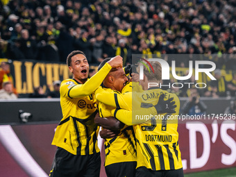 Donyell Malen of Borussia Dortmund celebrates his goal with teammates during the UEFA Champions League 2024/25 League Phase MD4 soccer match...