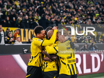 Donyell Malen of Borussia Dortmund celebrates his goal with teammates during the UEFA Champions League 2024/25 League Phase MD4 soccer match...