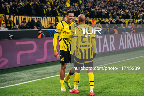 Donyell Malen of Borussia Dortmund celebrates his goal with Felix Nmecha during the UEFA Champions League 2024/25 League Phase MD4 soccer ma...