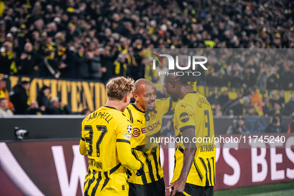 Donyell Malen of Borussia Dortmund celebrates his goal with Cole Campbell and Serhou Guirassy during the UEFA Champions League 2024/25 Leagu...