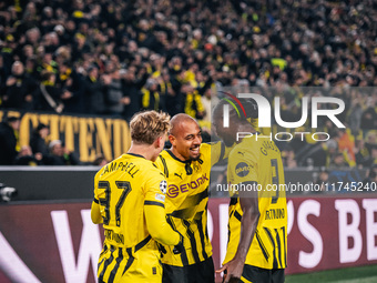 Donyell Malen of Borussia Dortmund celebrates his goal with Cole Campbell and Serhou Guirassy during the UEFA Champions League 2024/25 Leagu...