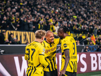 Donyell Malen of Borussia Dortmund celebrates his goal with Cole Campbell and Serhou Guirassy during the UEFA Champions League 2024/25 Leagu...