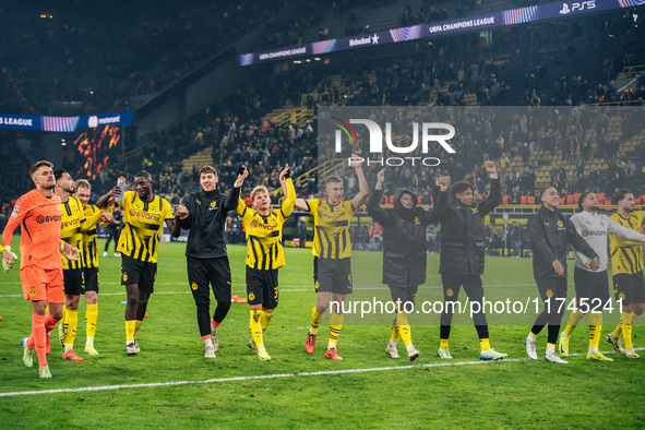 Players of Borussia Dortmund celebrate with fans after they win the UEFA Champions League 2024/25 League Phase MD4 soccer match between Boru...