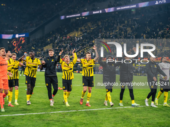 Players of Borussia Dortmund celebrate with fans after they win the UEFA Champions League 2024/25 League Phase MD4 soccer match between Boru...