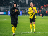 Julian Brandt and Marcel Sabitzer of Borussia Dortmund greet fans after winning the UEFA Champions League 2024/25 League Phase MD4 soccer ma...