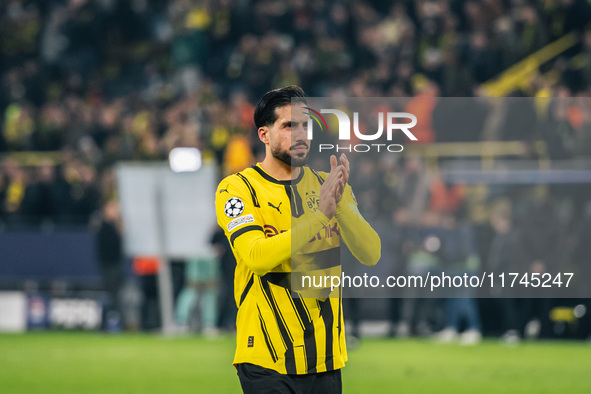 Emre Can of Borussia Dortmund greets fans after winning the UEFA Champions League 2024/25 League Phase MD4 soccer match between Borussia Dor...