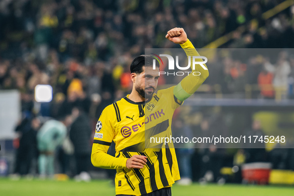 Emre Can of Borussia Dortmund greets fans after winning the UEFA Champions League 2024/25 League Phase MD4 soccer match between Borussia Dor...