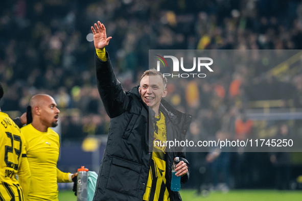 Maximilian Beier of Borussia Dortmund greets fans after winning the UEFA Champions League 2024/25 League Phase MD4 soccer match between Boru...