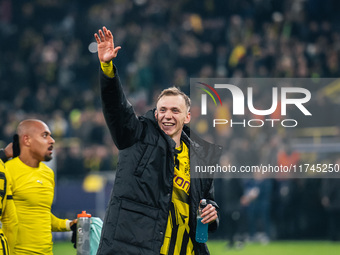 Maximilian Beier of Borussia Dortmund greets fans after winning the UEFA Champions League 2024/25 League Phase MD4 soccer match between Boru...