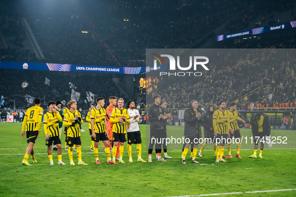 Players of Borussia Dortmund celebrate with fans after they win the UEFA Champions League 2024/25 League Phase MD4 soccer match between Boru...