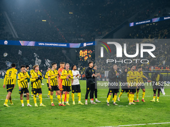 Players of Borussia Dortmund celebrate with fans after they win the UEFA Champions League 2024/25 League Phase MD4 soccer match between Boru...