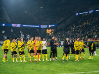 Players of Borussia Dortmund celebrate with fans after they win the UEFA Champions League 2024/25 League Phase MD4 soccer match between Boru...