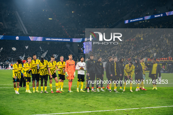 Players of Borussia Dortmund celebrate with fans after they win the UEFA Champions League 2024/25 League Phase MD4 soccer match between Boru...