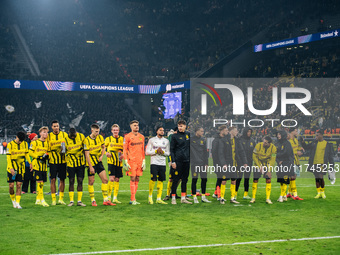 Players of Borussia Dortmund celebrate with fans after they win the UEFA Champions League 2024/25 League Phase MD4 soccer match between Boru...