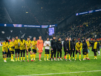 Players of Borussia Dortmund celebrate with fans after they win the UEFA Champions League 2024/25 League Phase MD4 soccer match between Boru...