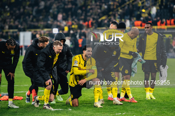 Emre Can of Borussia Dortmund celebrates with teammates after winning the UEFA Champions League 2024/25 League Phase MD4 soccer match betwee...