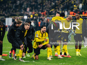 Emre Can of Borussia Dortmund celebrates with teammates after winning the UEFA Champions League 2024/25 League Phase MD4 soccer match betwee...