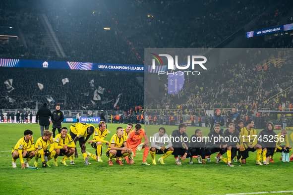 Players of Borussia Dortmund celebrate with fans after they win the UEFA Champions League 2024/25 League Phase MD4 soccer match between Boru...