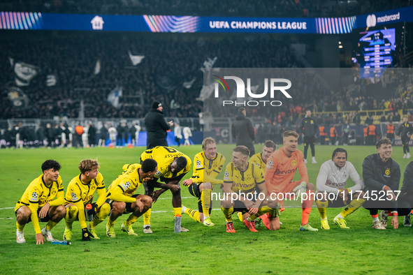 Players of Borussia Dortmund celebrate with fans after they win the UEFA Champions League 2024/25 League Phase MD4 soccer match between Boru...