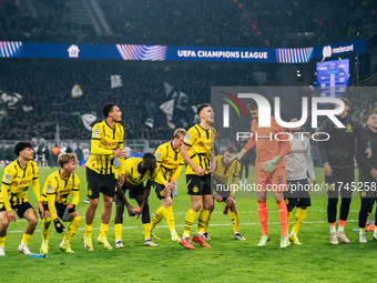 Players of Borussia Dortmund celebrate with fans after they win the UEFA Champions League 2024/25 League Phase MD4 soccer match between Boru...