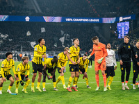 Players of Borussia Dortmund celebrate with fans after they win the UEFA Champions League 2024/25 League Phase MD4 soccer match between Boru...