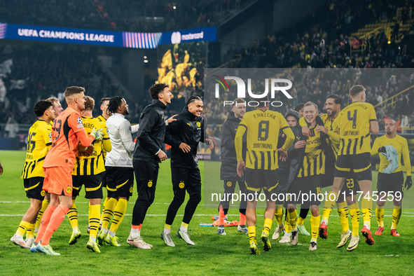 Players of Borussia Dortmund celebrate with fans after they win the UEFA Champions League 2024/25 League Phase MD4 soccer match between Boru...