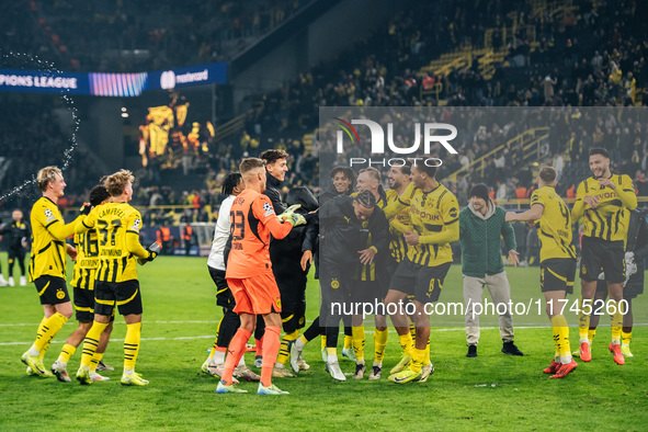 Players of Borussia Dortmund celebrate with fans after they win the UEFA Champions League 2024/25 League Phase MD4 soccer match between Boru...