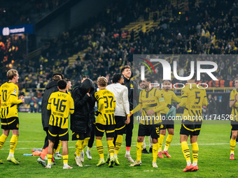 Players of Borussia Dortmund celebrate with fans after they win the UEFA Champions League 2024/25 League Phase MD4 soccer match between Boru...