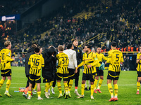 Players of Borussia Dortmund celebrate with fans after they win the UEFA Champions League 2024/25 League Phase MD4 soccer match between Boru...