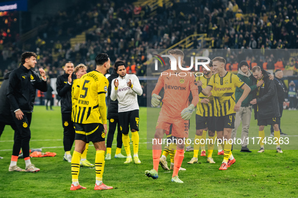 Players of Borussia Dortmund celebrate with fans after they win the UEFA Champions League 2024/25 League Phase MD4 soccer match between Boru...