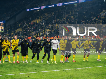 Players of Borussia Dortmund celebrate with fans after they win the UEFA Champions League 2024/25 League Phase MD4 soccer match between Boru...