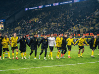 Players of Borussia Dortmund celebrate with fans after they win the UEFA Champions League 2024/25 League Phase MD4 soccer match between Boru...