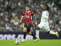 Christian Pulisic right winger of AC Milan and United States and Eduardo Camavinga central midfield of Real Madrid and France compete for th...