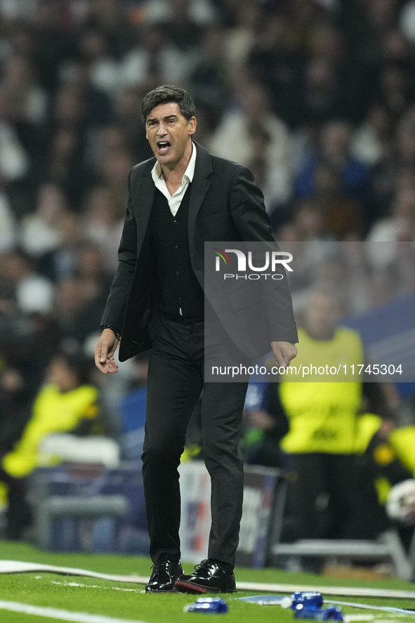 Paulo Fonseca head coach of AC Milan gives instructions during the UEFA Champions League 2024/25 League Phase MD4 match between Real Madrid...