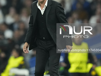 Paulo Fonseca head coach of AC Milan gives instructions during the UEFA Champions League 2024/25 League Phase MD4 match between Real Madrid...