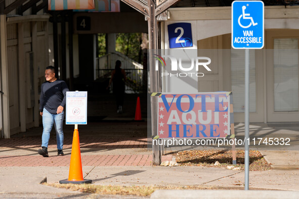 A voter leaves the polling place at a church in West Austin. Voters in the Texas Capital meet with short lines at most polling places across...