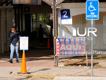 A voter leaves the polling place at a church in West Austin. Voters in the Texas Capital meet with short lines at most polling places across...