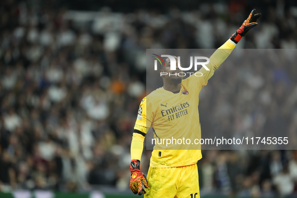 Mike Maignan goalkeeper of AC Milan and France gives instructions during the UEFA Champions League 2024/25 League Phase MD4 match between Re...