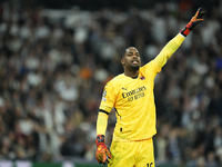 Mike Maignan goalkeeper of AC Milan and France gives instructions during the UEFA Champions League 2024/25 League Phase MD4 match between Re...